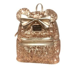 Disney parks authentic Loungefly backpack rose gold.